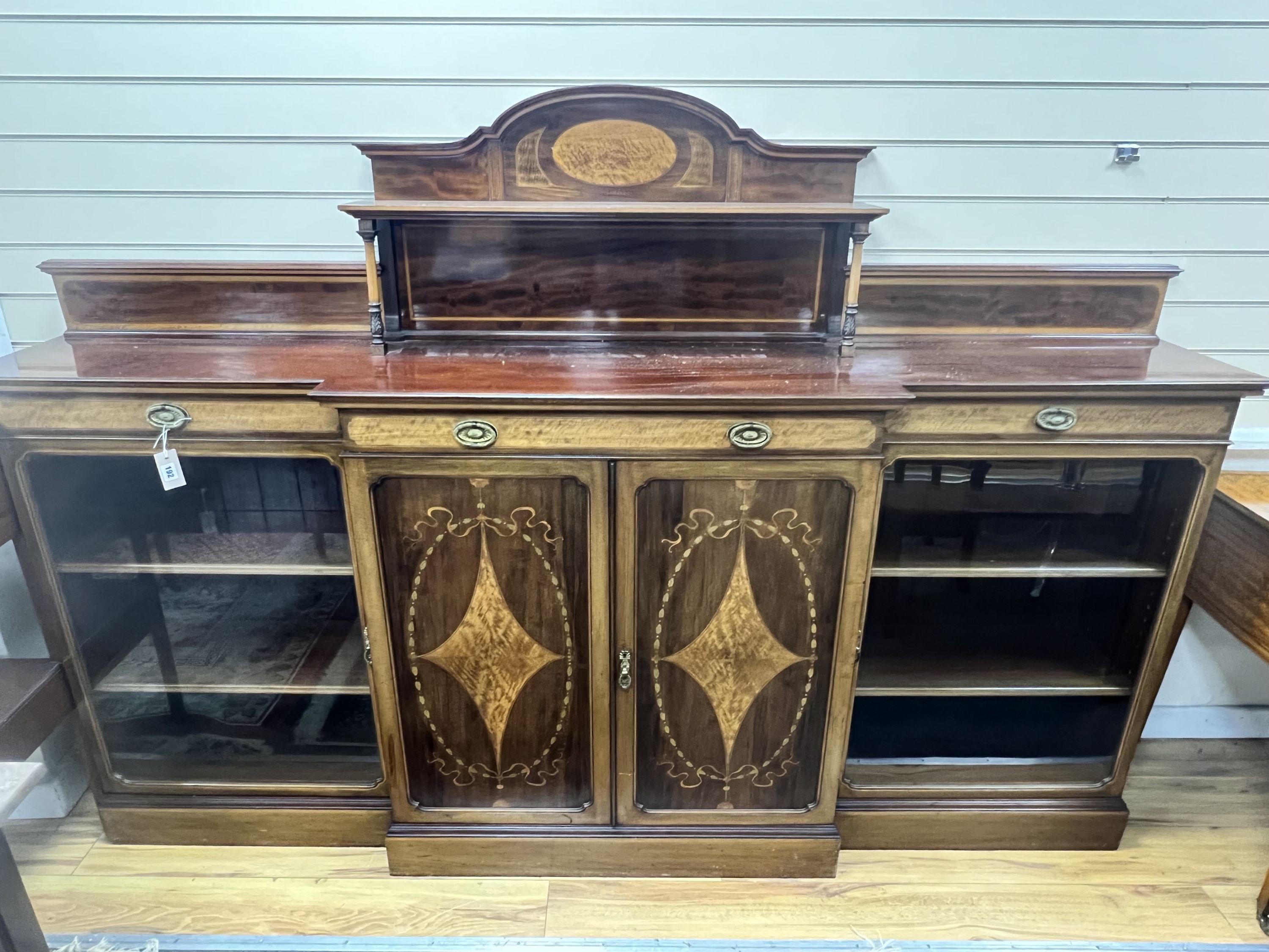 An Edwardian marquetry inlaid mahogany breakfront side cabinet, width 227cm depth 39cm height 155cm